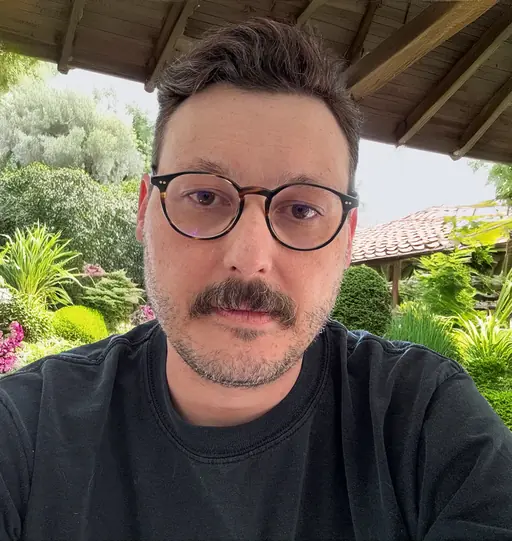 Professional headshot of Owen Wiggins